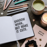 Cute but gritty journal setup with pastels and dark background, styled with sparkles and handwritten journaling.