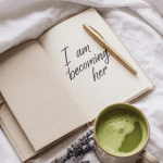 Minimalist journal setup with beige linens, gold pen, and a peaceful, soft girl aesthetic.