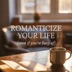 Golden hour journal setup with soft light and a cozy mug. Overlay text says “Romanticize Your Life (Even If You’re Busy AF).”